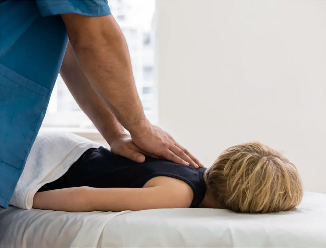 Child standing tall for a posture check
